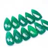 Natural Green Onyx Faceted Pyramid Trillion Drops Pair Sold per 1 pair & Sizes 15mm x 8mm approx. Chalcedony is a cryptocrystalline variety of quartz. Comes in many colors such as blue, pink, aqua. Also known to lower negative energy for healing purposes. 